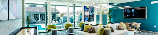 Clubhouse with game area at THE RISE APARTMENT HOMES, Las Vegas, 89139