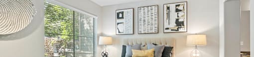 a bedroom with a bed and a ceiling fan at Ascent Apartments, Utah, 84121