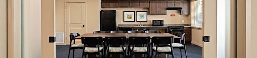 Large room with tables at TRADITIONS AT LAFAYETTE Apartments, LAFAYETTE 