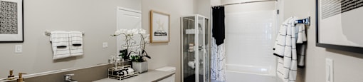 a bathroom with a sink and a toilet and a shower at SYNC APARTMENT HOMES, Nevada, 89084