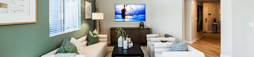 Living Room With TV at SYNC APARTMENT HOMES, North Las Vegas