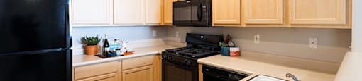 Kitchen with appliances at THE CLUBS AT RHODES RANCH APARTMENT HOMES, Las Vegas