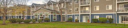 Grass Field and Apt Building at VINTAGE AT BREMERTON, Bremerton, WA, 98310