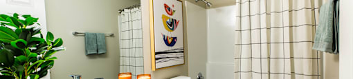 a bathroom with a sink and a toilet and a shower at Mountain Run Apartments, Orem, UT 84058