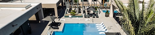 an overhead view of a swimming pool at a hotel