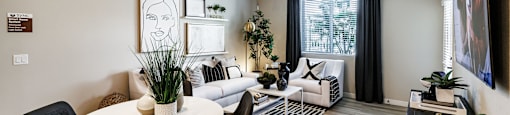 a living room with a couch and a table