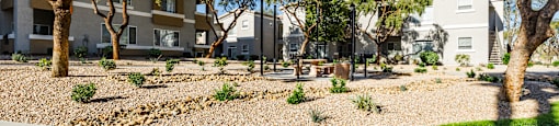 A residential area with houses and trees.
