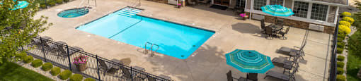 A house with a pool in the backyard.