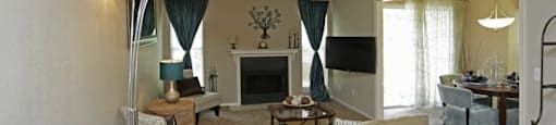 a living room filled with furniture and a fire place