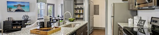 A kitchen with a granite countertop and stainless steel appliances.