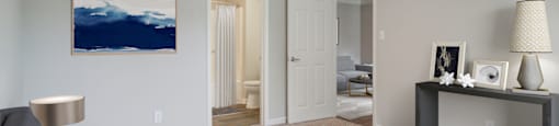 Bedroom with bathroom and carpet flooring at Place at Midway apartments in Douglasville near Lithia Springs, GA
