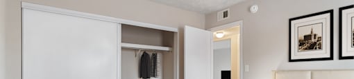 Mableton Ridge Apartments in Mableton GA photo of Vibrant Cozy Bedroom with Closet View
