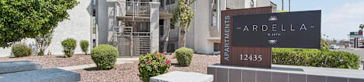 The image shows a building with a sign that reads "Ardella Apartments 12435".