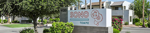 A sign for Sonora in Tempe is displayed in front of a building.