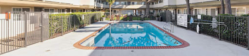 A swimming pool in the middle of a residential area.