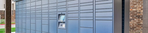 A large blue storage unit with a door and a window.