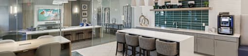 Clubhouse interior with lounge seating and open layout at Lotus at Starkey Ranch in Odessa, Florida.