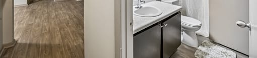 A bathroom with a white sink and a white toilet.