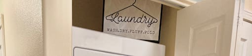 Two-Bedroom Apartments in Spokane, WA - Deer Creek - Laundry Closet with Stacked Washer and Dryer.