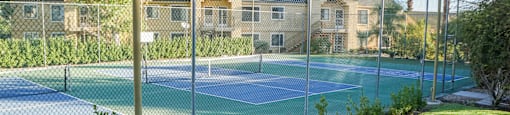 Senior Apartments in Paradise Las Vegas NV with In-Unit Washer and Dryer | Gramercy Parc | Exterior Shot of the Outdoor Tennis Court