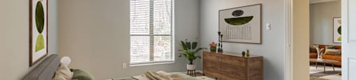 Bright and spacious bedroom at Forest Glen apartments in Austell, GA 30106, near South Cobb County and Douglasville.