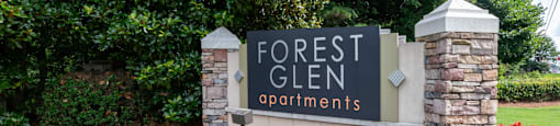 Entrance sign for Forest Glen apartments in Austell, GA 30106, near South Cobb County and Douglasville.