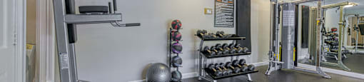 Modern fitness studio featuring strength training machines at Forest Glen apartments in Austell, GA 30106, near South Cobb County and Douglasville.