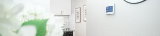 The Element at River Pointe apartments in Jacksonville Florida photo of view of dining room into kitchen.