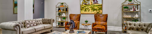 a living room with couches and chairs and a rug at LIV at Boerne Hills an Active Senior Community 62+, Texas, 78006