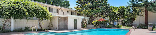 Apartments for Rent in San Jose CA - Los Gatos Creek - Pool with Poolside Restrooms Surrounded by Lush Landscaping