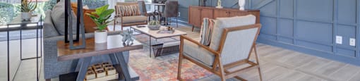 Resident clubhouse at Mirador at Idlewood in Clarkston, Georgia, offering stylish lounge seating, social spaces, and community amenities.