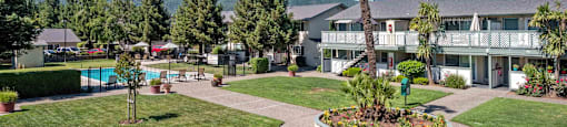 Apartments for Rent Gilroy CA - Mission Park - Spacious Grass Courtyard Next to the Pool