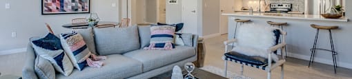 Tigard, OR Apartments-Sygnii- Living Room with an Open Layout, Recessed Lighting, and Hardwood Style Flooring