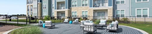 Apartments for Rent Georgetown - Exterior View of Williamson at the Overlook Apartments, Private Balconies, and an Expansive Outdoor Area With Lounge Seating