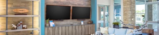 Apartments for Rent in Georgetown - Williamson at the Overlook Apartments - sitting area clubhouse with tvs