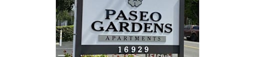 a sign for pasco gardens apartments