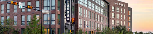 A street view of The Laura exterior building.