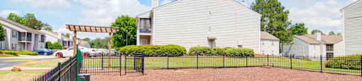 Fenced, leash-free dog park with open play space at Place at Midway apartments in Douglasville near Lithia Springs, GA