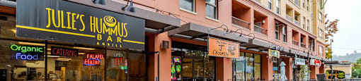 A restaurant named Julie's Hummus Bar is located in a shopping center.