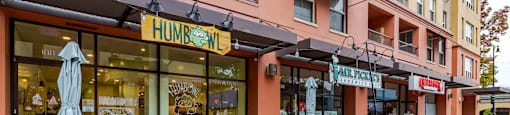 A storefront with a sign that says "HUMBROW" is visible.
