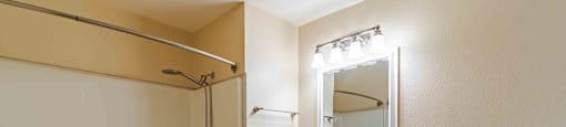 A bathroom with a white toilet, a white sink, a white bathtub, and a white cabinet.