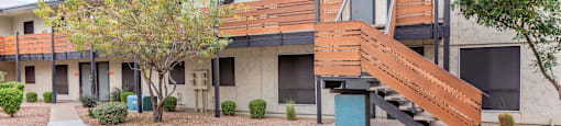 Exterior view of Sono Tempe, a pet-friendly apartment community in Tempe near downtown Tempe, AZ, showcasing modern architecture and landscaped grounds.