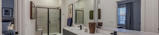 Apartments in Downtown Dallas for Rent- 4600 Ross- Kitchen with Stainless-Steel Appliances and Modern White & Grey Cabinets