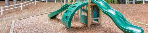 Community playground with safe play equipment at Grande Club apartments in Duluth, GA 30096, near Lawrenceville.