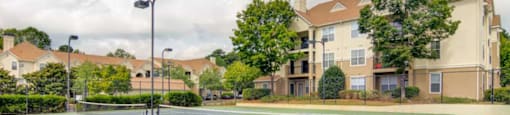Illuminated tennis courts at Grande Club apartments in Duluth, GA 30096, near Lawrenceville.