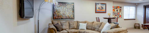 a living room with a couch and a television