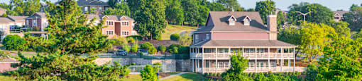 a view of a building overlooking a body of water