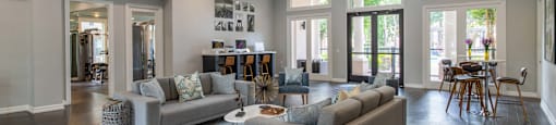 Leasing office and business center with sophisticated clubhouse and seating at Sagewood at WestchaseHouston TX for residents’ convenience
