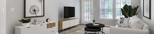 Living room with large windows at Sagewood at Westchase apartments in Houston, Texas.