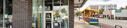 A Step House storefront with a blue sign above the entrance.